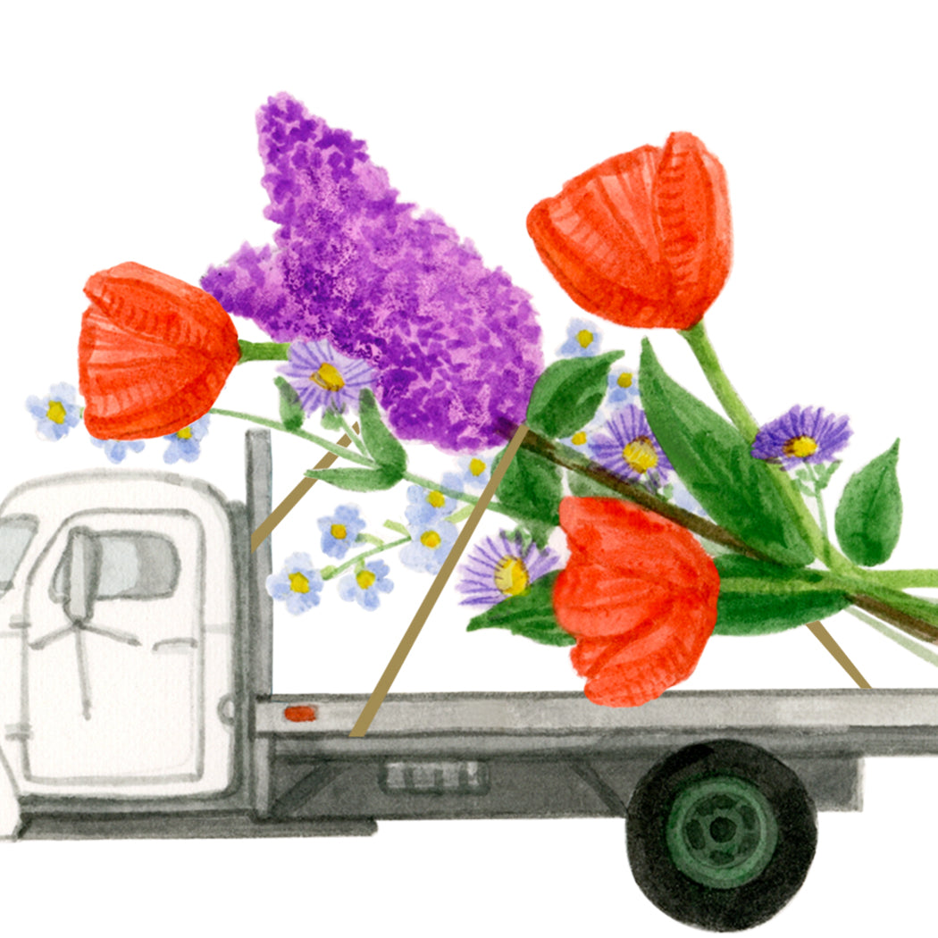 A greeting card with a giant bouquet of tulips, lilacs and wildflowers on the back of a vintage truck.