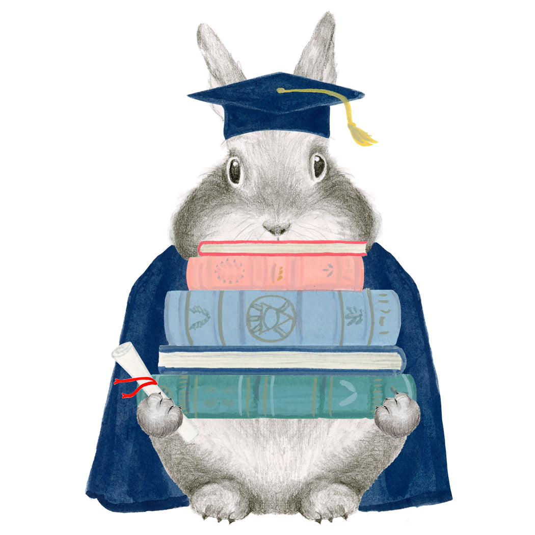 Graphite bunny in a hand painted cap and gown holding a stack of books and a diploma.