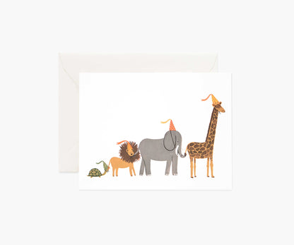 Greeting card featuring illustrations of a turtle, lion, elephant, and giraffe on natural white cover paper from Rifle Paper Co.&