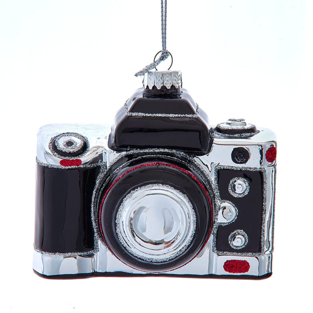 Camera-shaped ornament on a white background