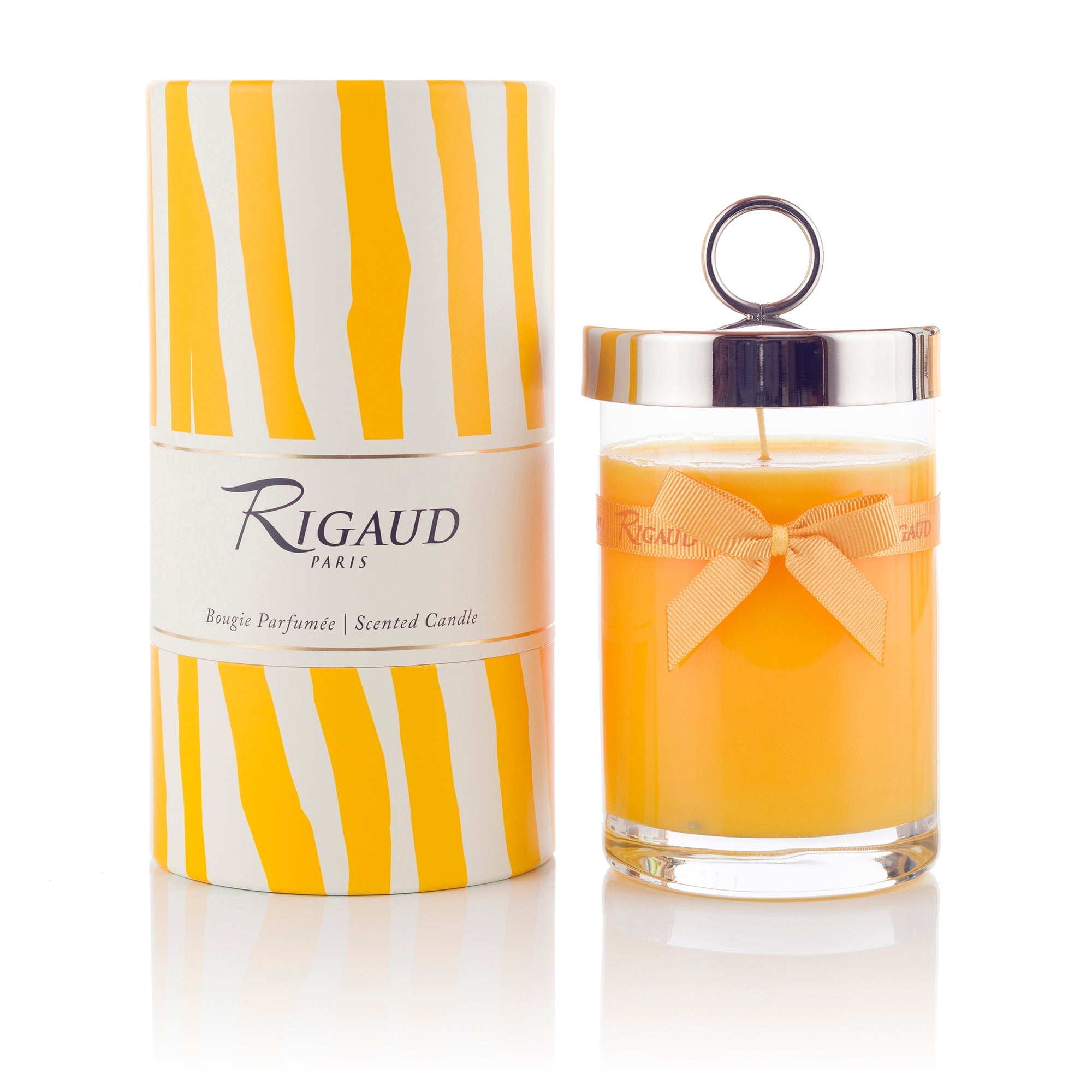 Large Rigaud Tournesol candle and tube shaped box.
