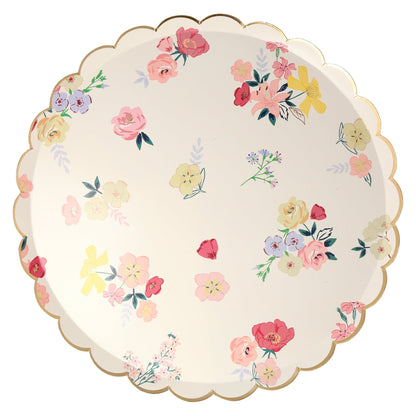 Four Meri Meri English Garden plates with floral designs on them.