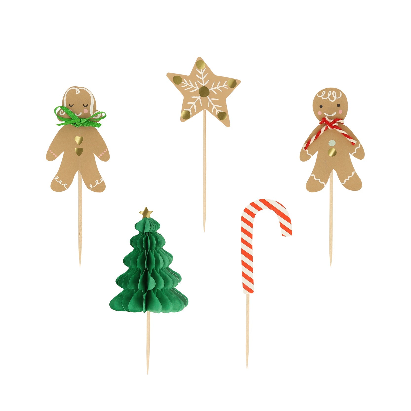a gingerbread man, a gingerbread woman, a candy cane, a gingerbread star and a Christmas trees cake toppers