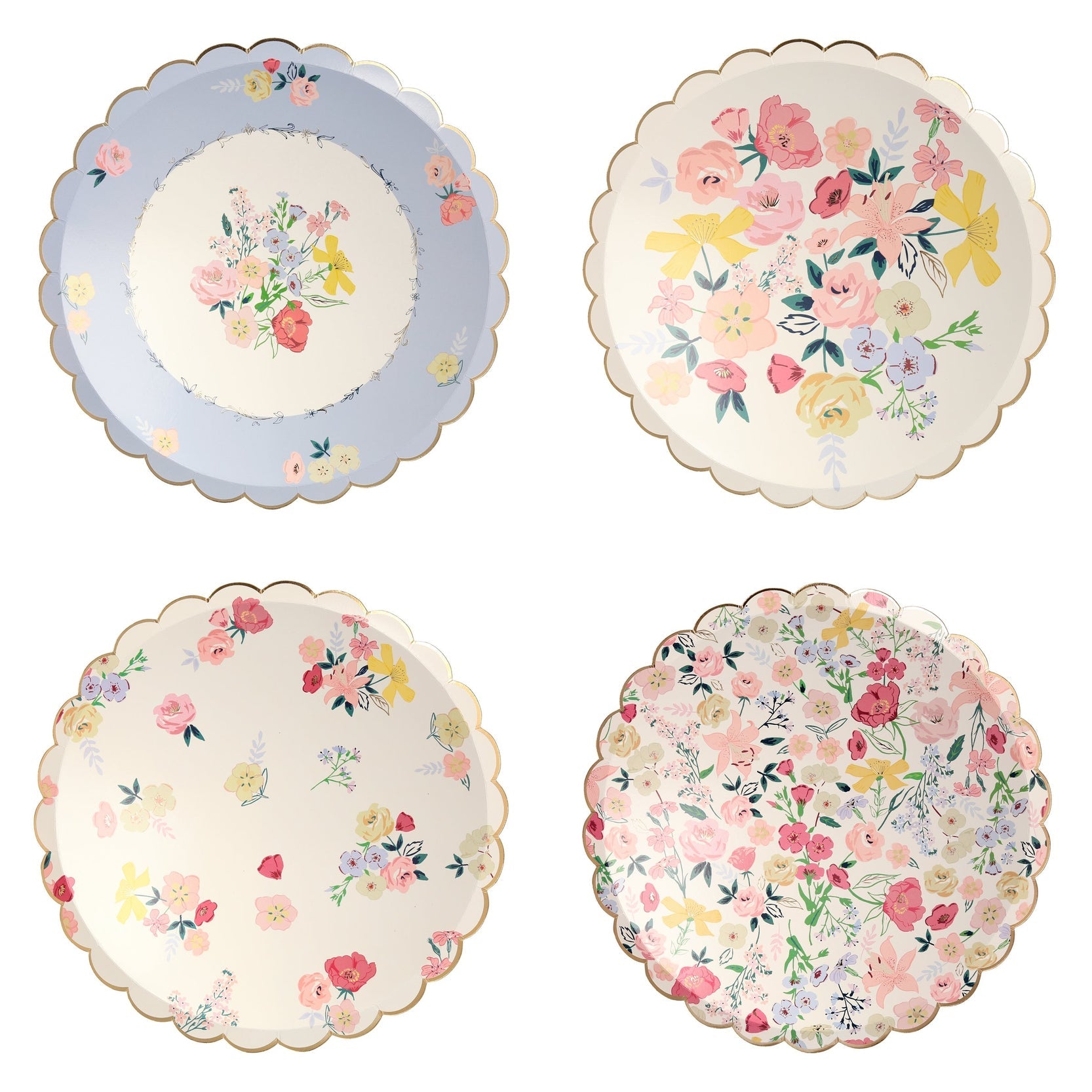 Four Meri Meri English Garden plates with floral designs on them.