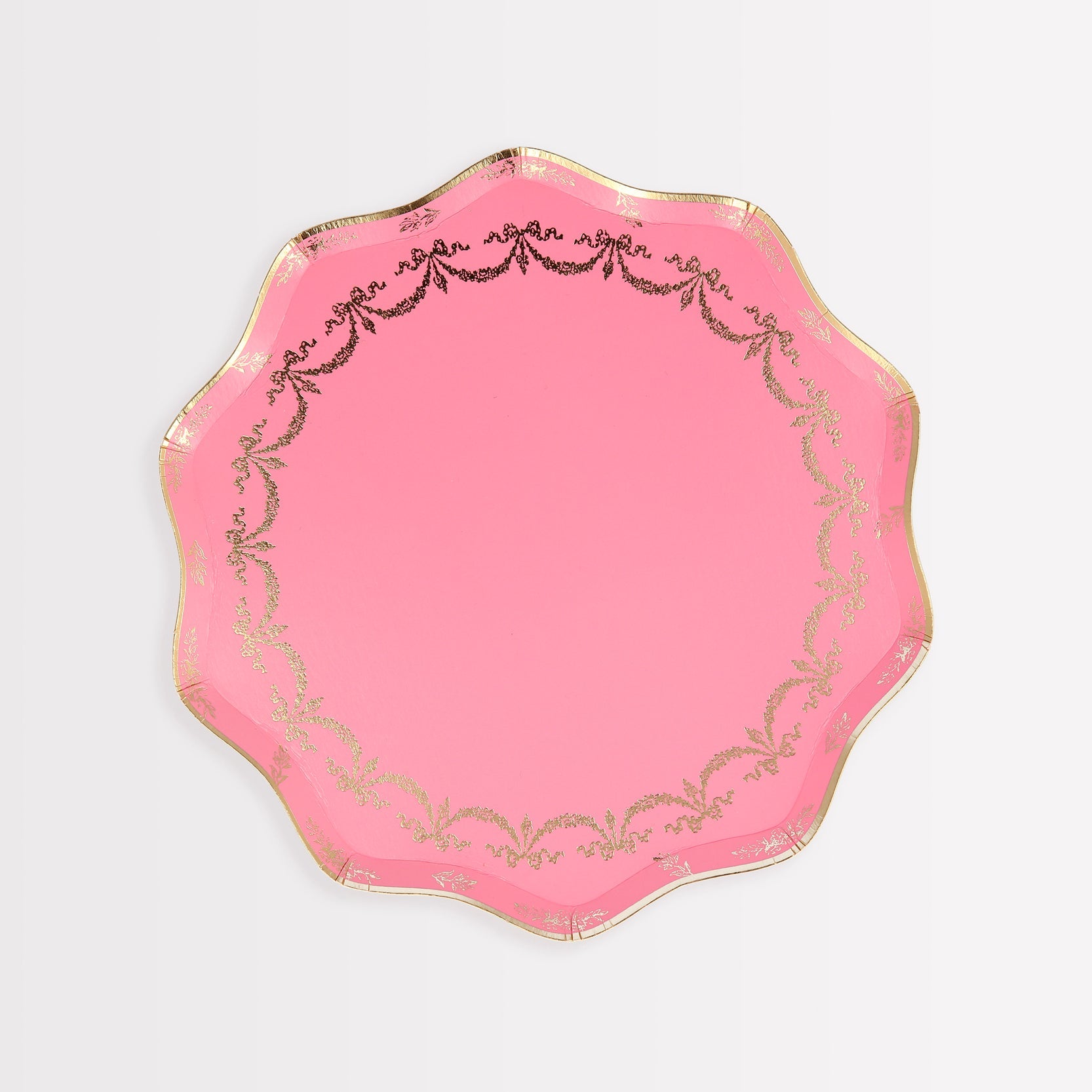 A Meri Meri Ladurée Paris Paper Plate with gold trim.