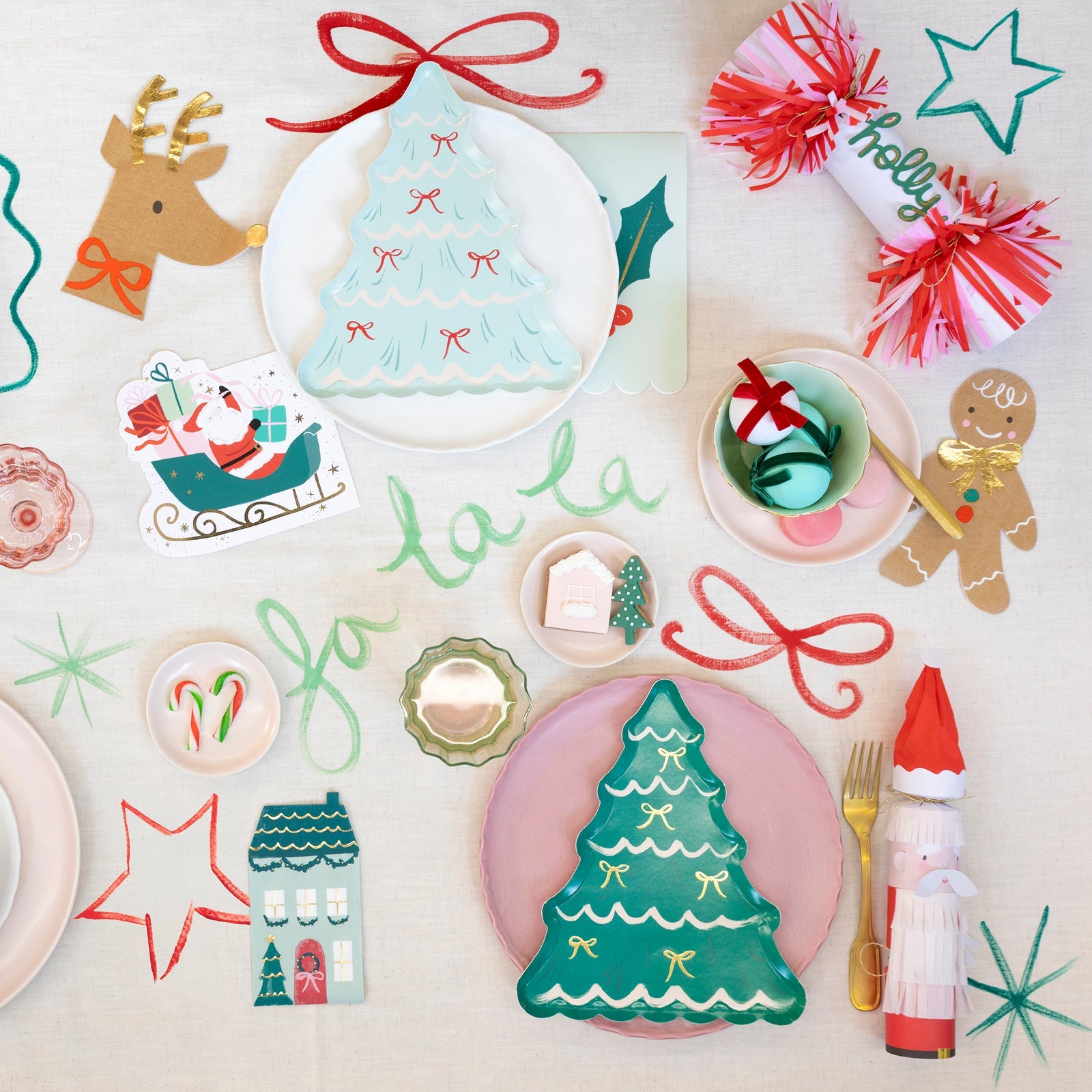Decorative Christmas-themed plates with festive designs on a white surface.