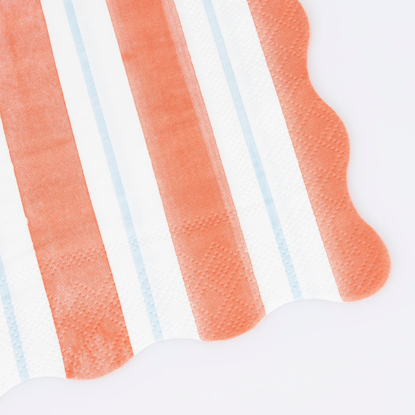 Close up of scallop edge on Meri Meri Preppy Stripe Napkin.