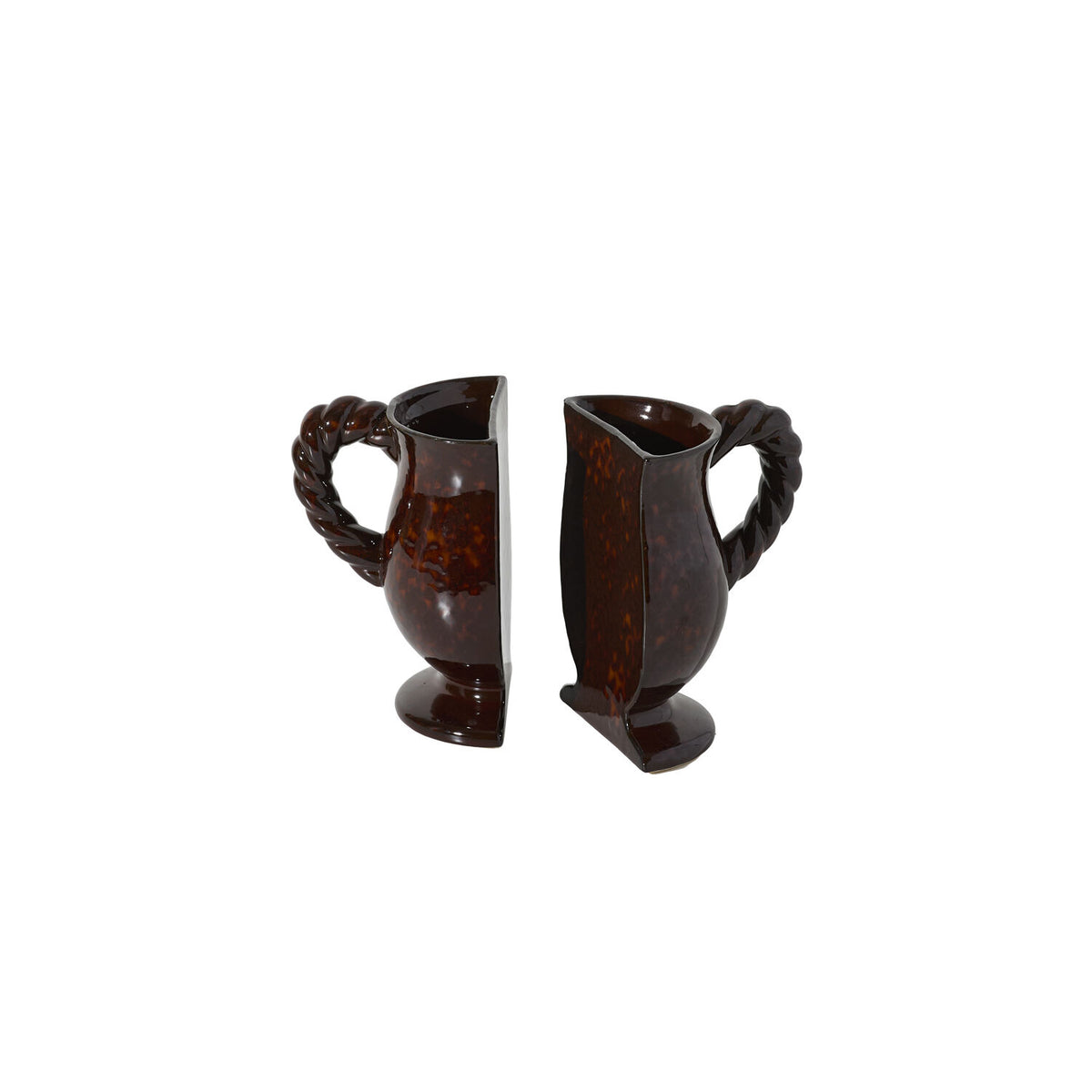 Two dark brown ceramic bookend vases with handles on a white background.