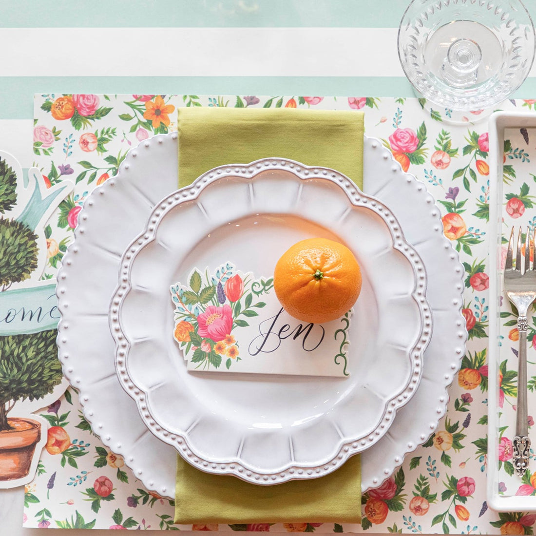 The Sweet Garden Placemat under an elegant springtime place setting, from above.