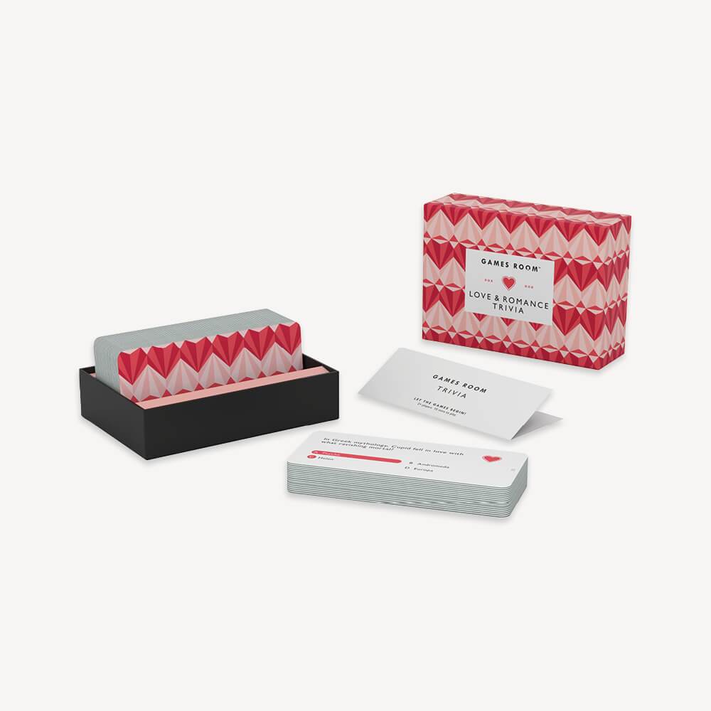 A boxed Love and Romance Trivia game with a geometric heart pattern by Chronicle Books.