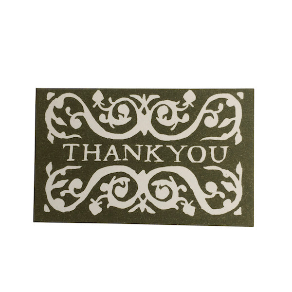 A selection of Cambridge Imprint Arabesque Thank You Cards with intricate designs next to two pencils, crafted on FSC-certified stock.