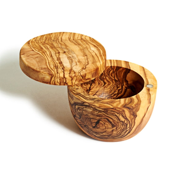 An Natural Olivewood olive wood salt cellar with the rotating lid open.