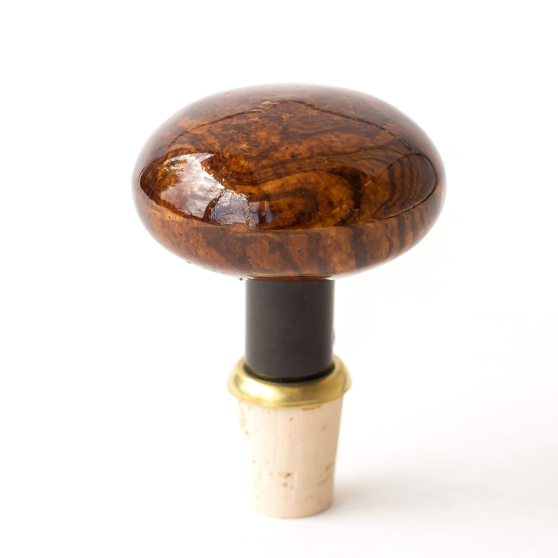 Polished wooden bottle stopper with a cork base featuring a unique Hester &amp; Cook Brown Porcelain Knobstopper against a white background.
