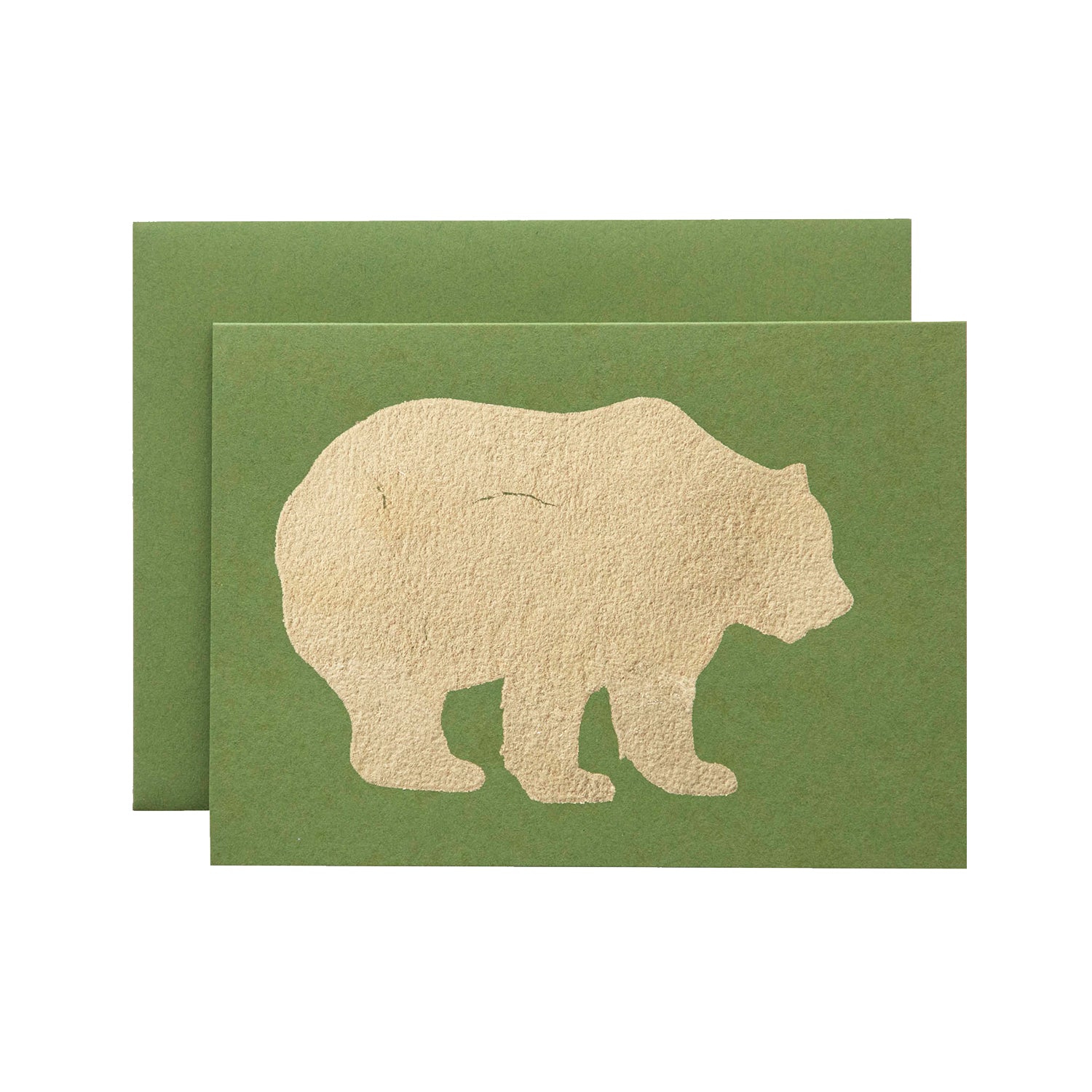 A leaf-green card with the silhouette of a bear in solid gold leaf.