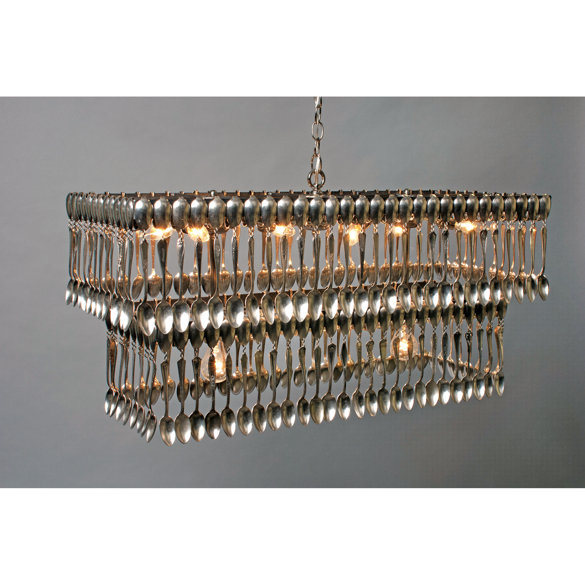 Double Tier Rectangular Spoondelier with multiple reflective pendants against a gray background by Hester & Cook.