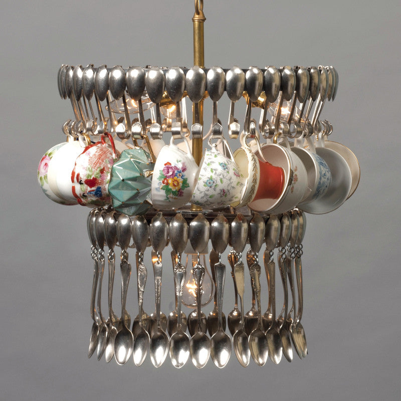 An unconventional Double Teacup chandelier made from suspended silverware and vintage teacups by Hester &amp; Cook.