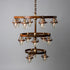 Two-tiered circular Triple Telegraph Chandelier with antique glass insulators, exposed bulbs, and bronze finish by Hester & Cook.