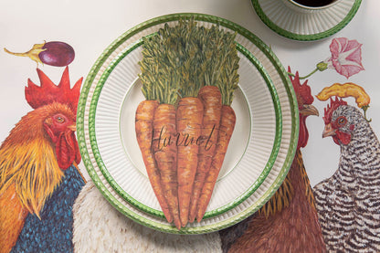 A Carrots Table Accent labeled &quot;Harriet&quot; resting on the plate of a rustic place setting, from above.