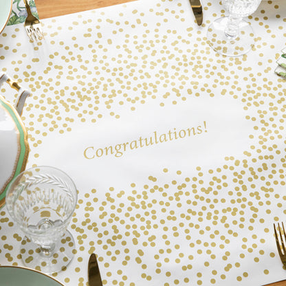 A white paper runner with gold confetti dots scattered around the perimeter, with an open area in the middle for a personalized message.