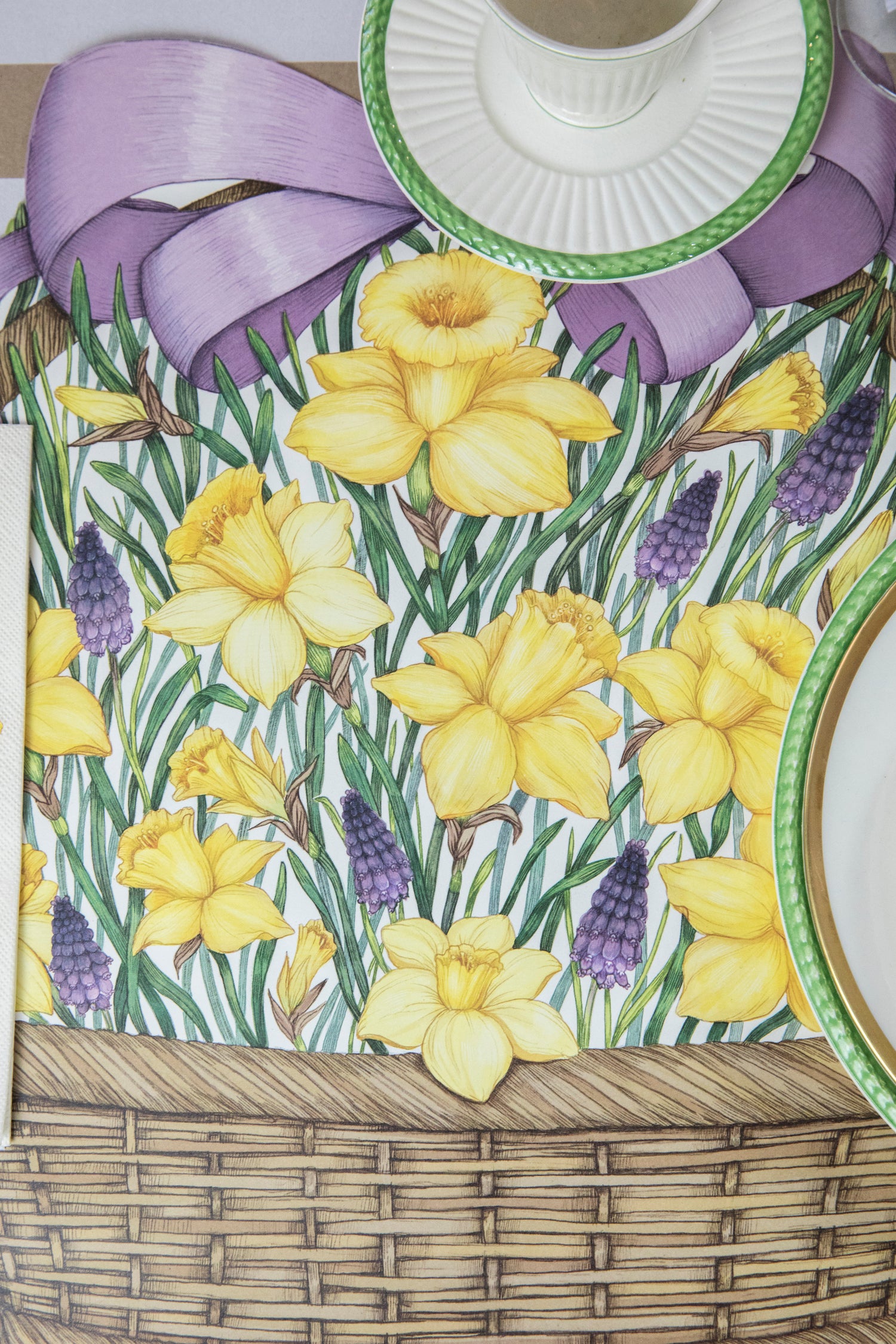 Close-up of the Die-cut Daffodil Basket Placemat under an elegant Easter place setting, showing the flowers in detail.