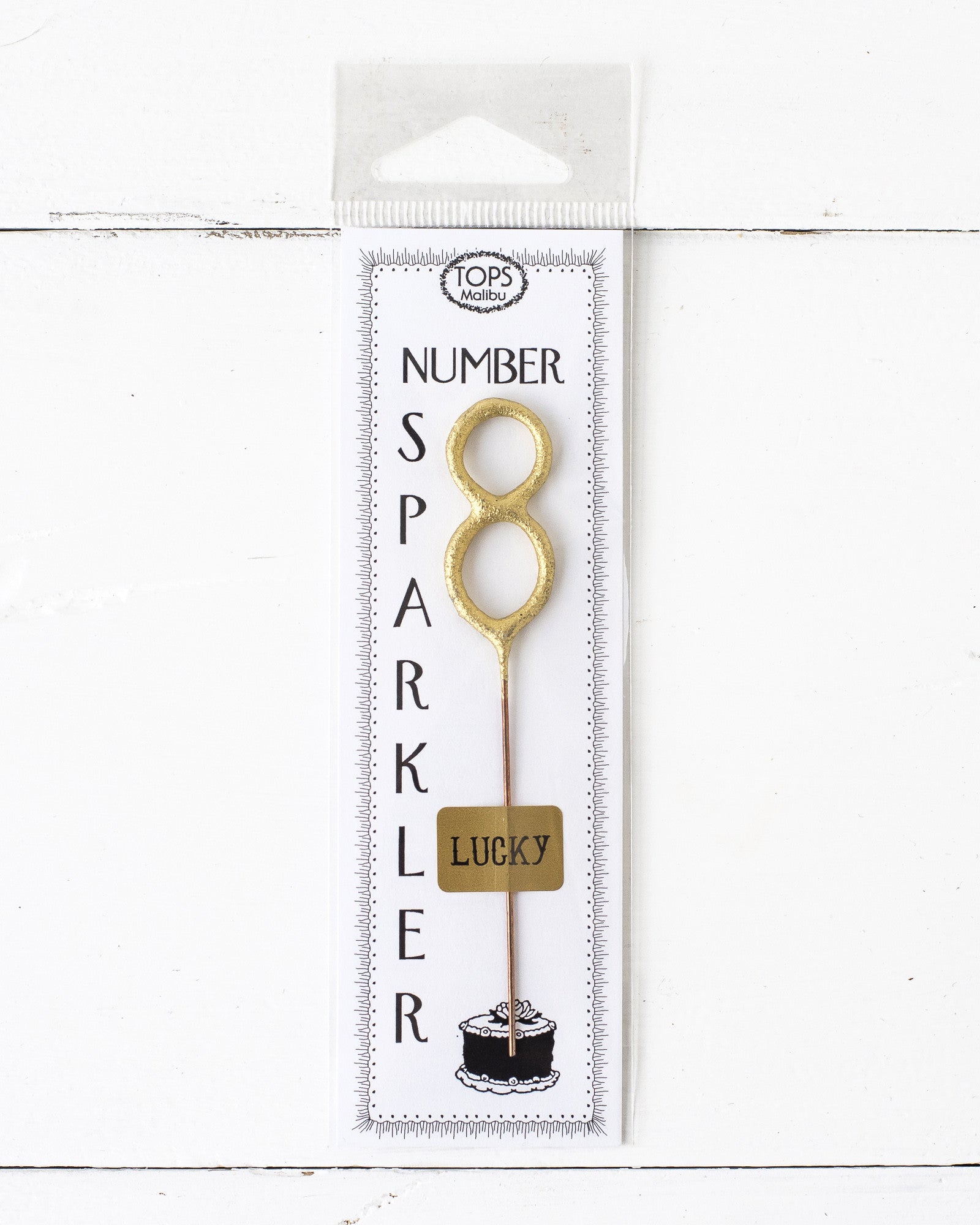 A 4" tall Gold Number Cake Topper Sparkler from Tops Malibu, perfect for an instant party.