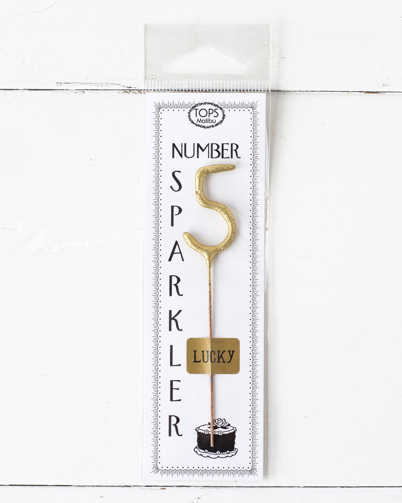 A 4" tall Gold Number Cake Topper Sparkler with the number 5 on it, perfect for an instant party from Tops Malibu.
