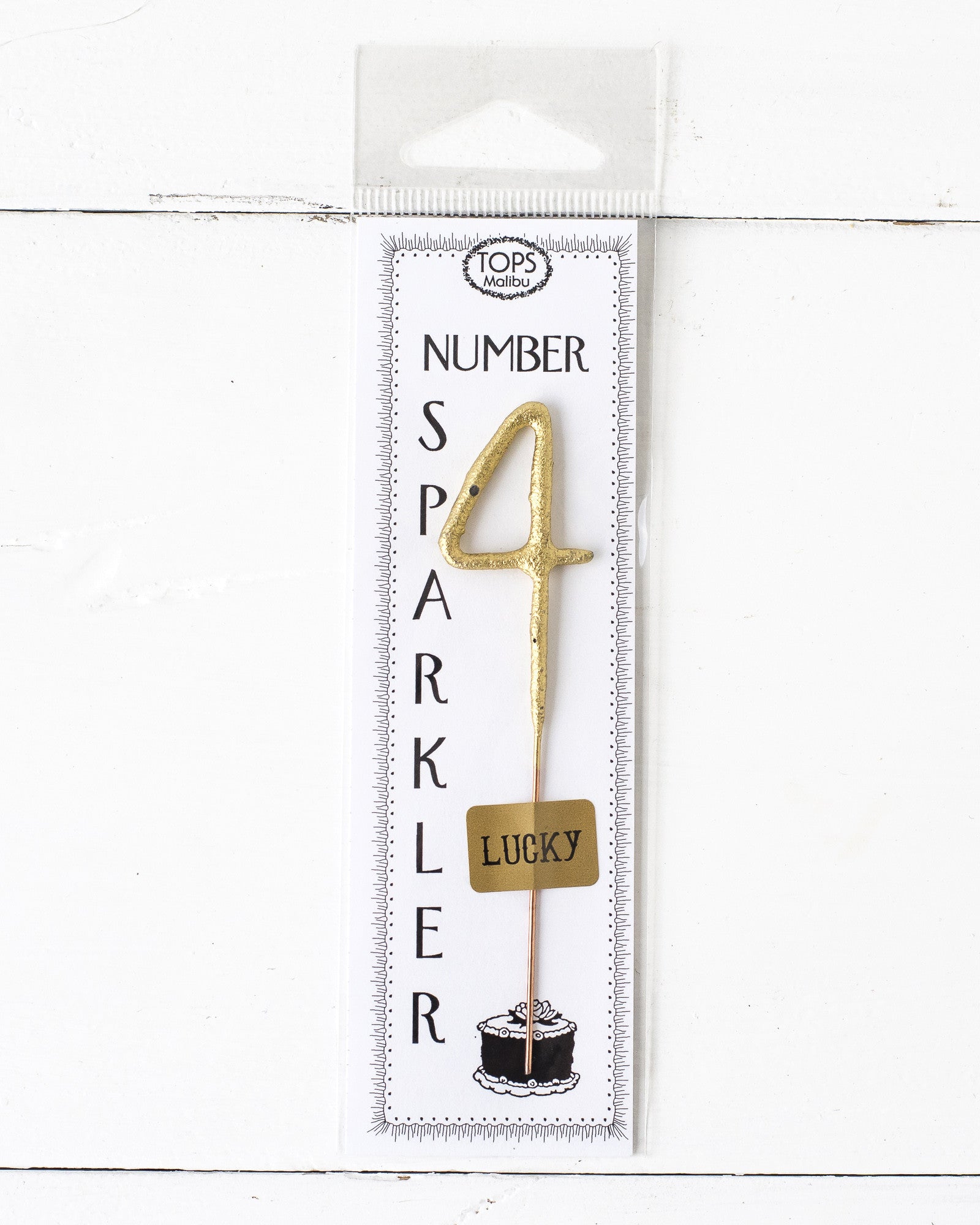 A 4" tall Gold Number Cake Topper Sparkler on a white background by Tops Malibu.