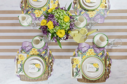 The Die-cut Daffodil Basket Placemat under an elegant Easter table setting for four, from above.