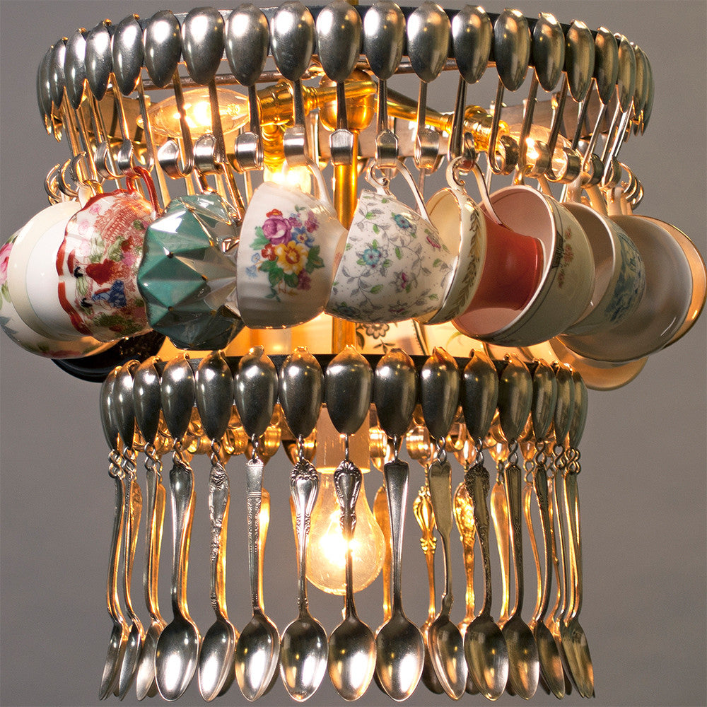 An unconventional Double Teacup chandelier made from suspended silverware and vintage teacups by Hester & Cook.