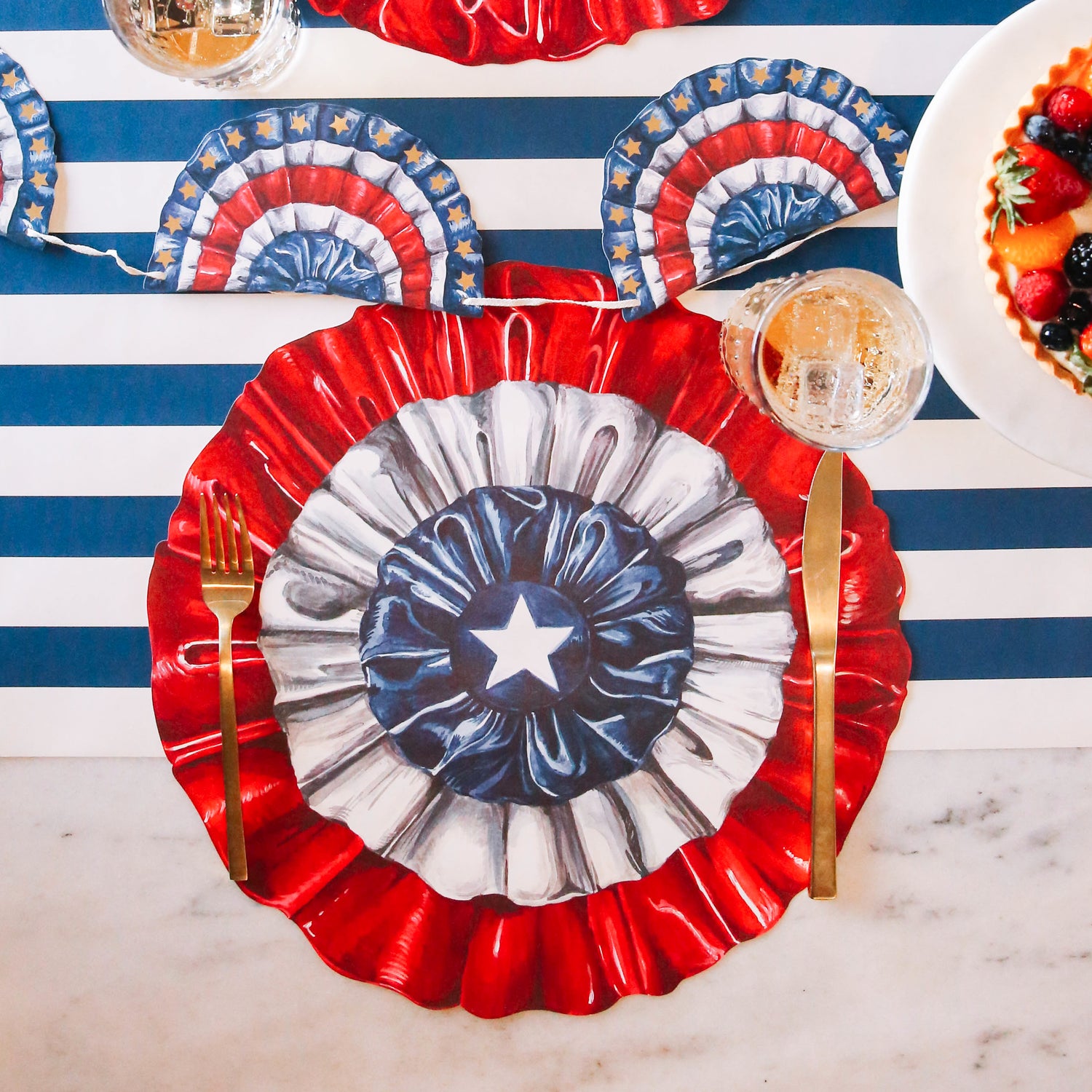 The Die-cut Star-Spangled Placemat on a patriotic table setting sans plate, showing the full design.