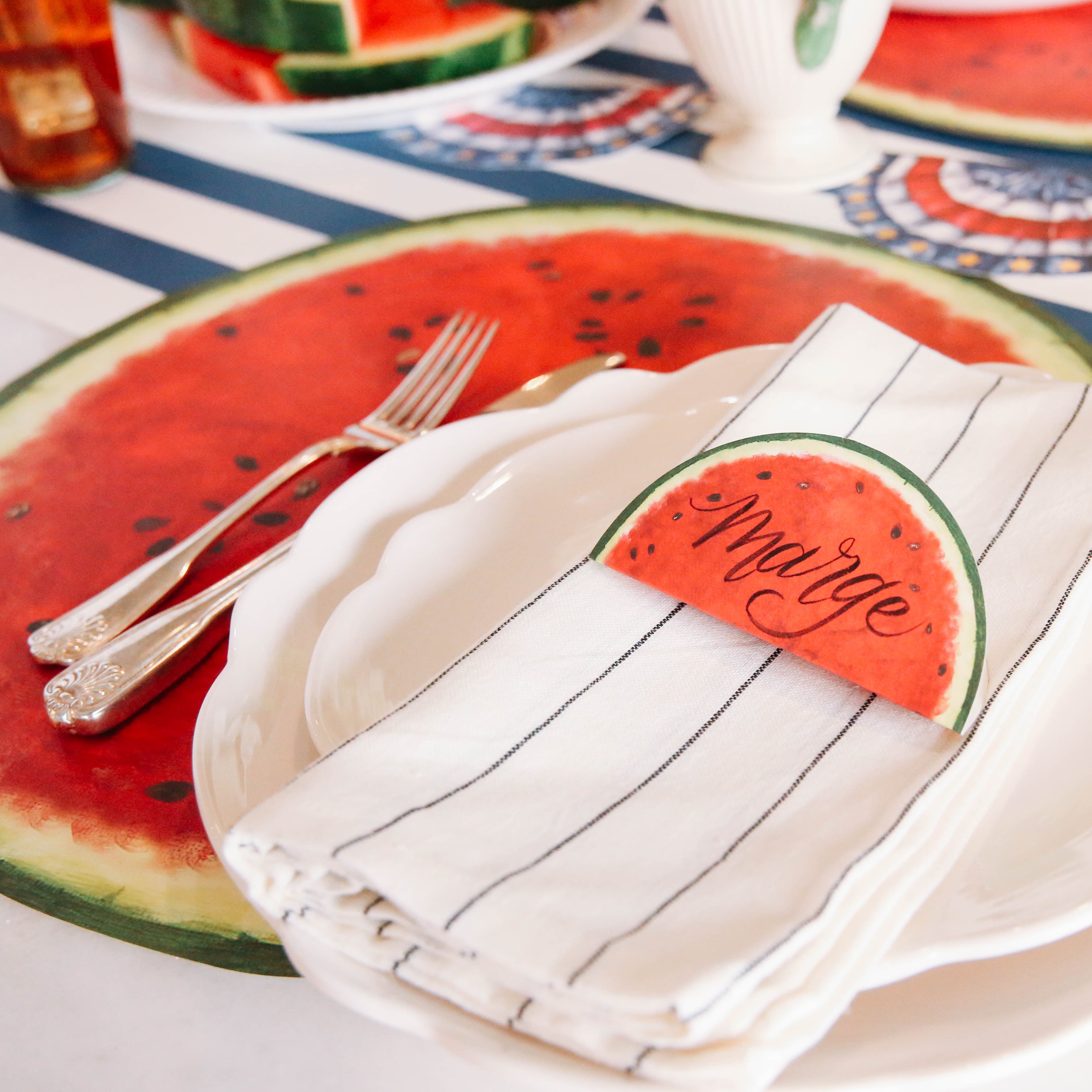 Close-up of the Die-cut Watermelon Placemat under a summertime place setting.