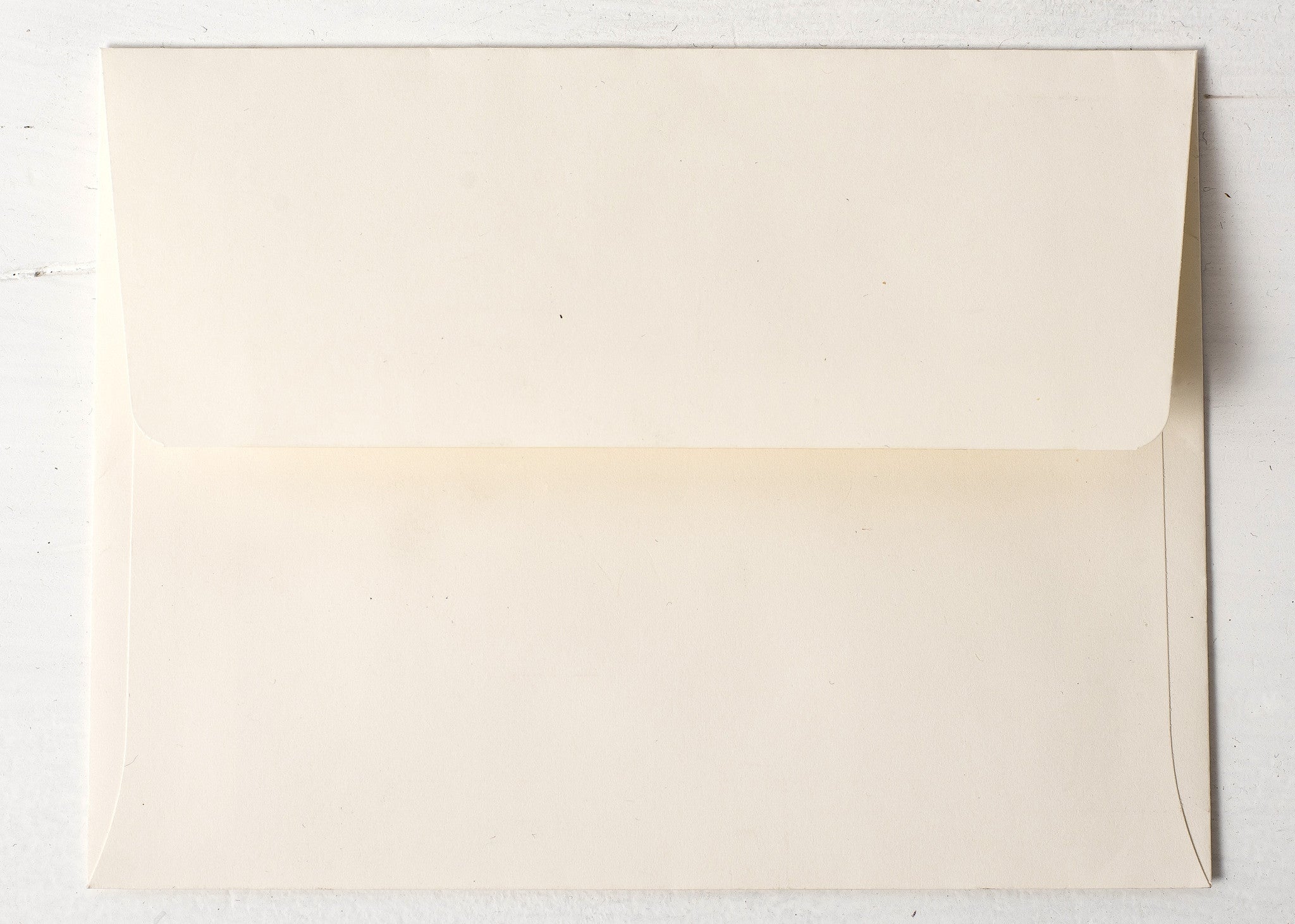 An off-white envelope, included with every card.