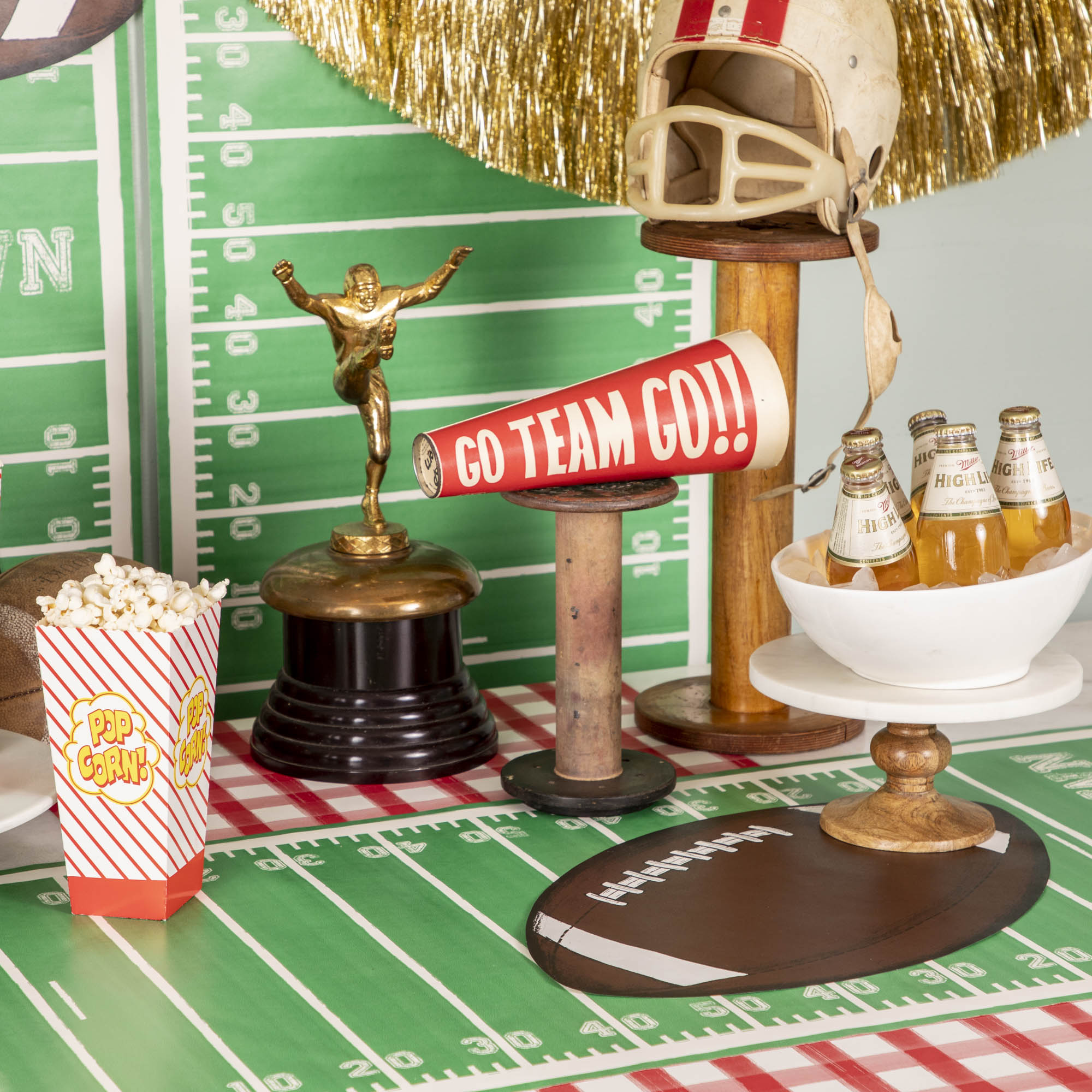 The Touchdown Runner used as a wall paper and table runner for a game day spread.