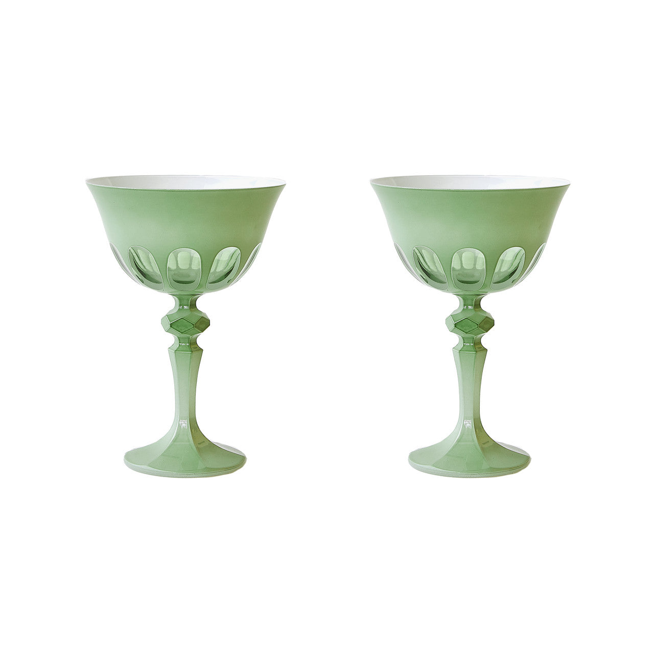 A set of SIR/MADAM Rialto Pale Sage Glasses and a bowl on a marble table.