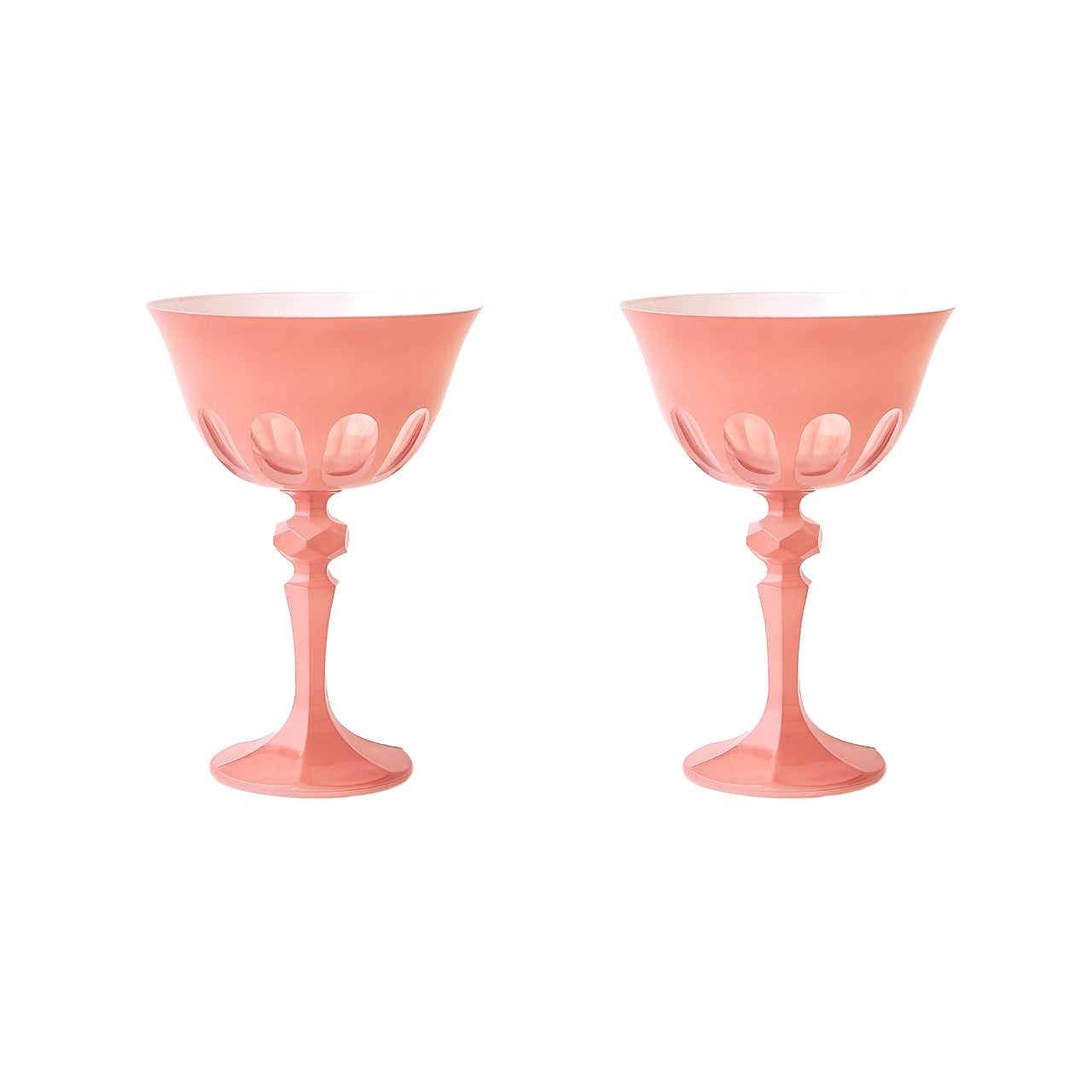 A set of four Rialto Salmon Glasses by SIR/MADAM on a white surface.