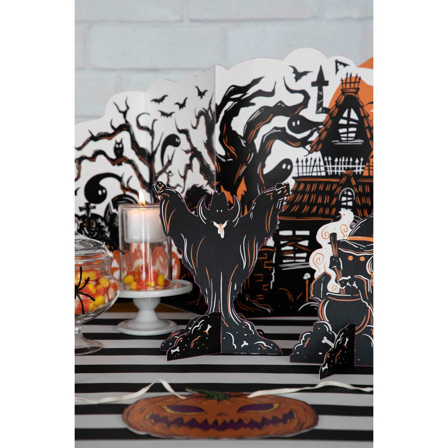 Three Monster Mash Table Ornaments, depicting spooky creatures, on a white background by Hester & Cook.