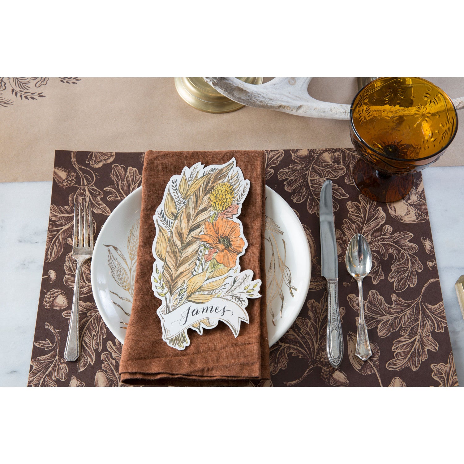 The Into The Woods Placemat under an elegant place setting, from above.