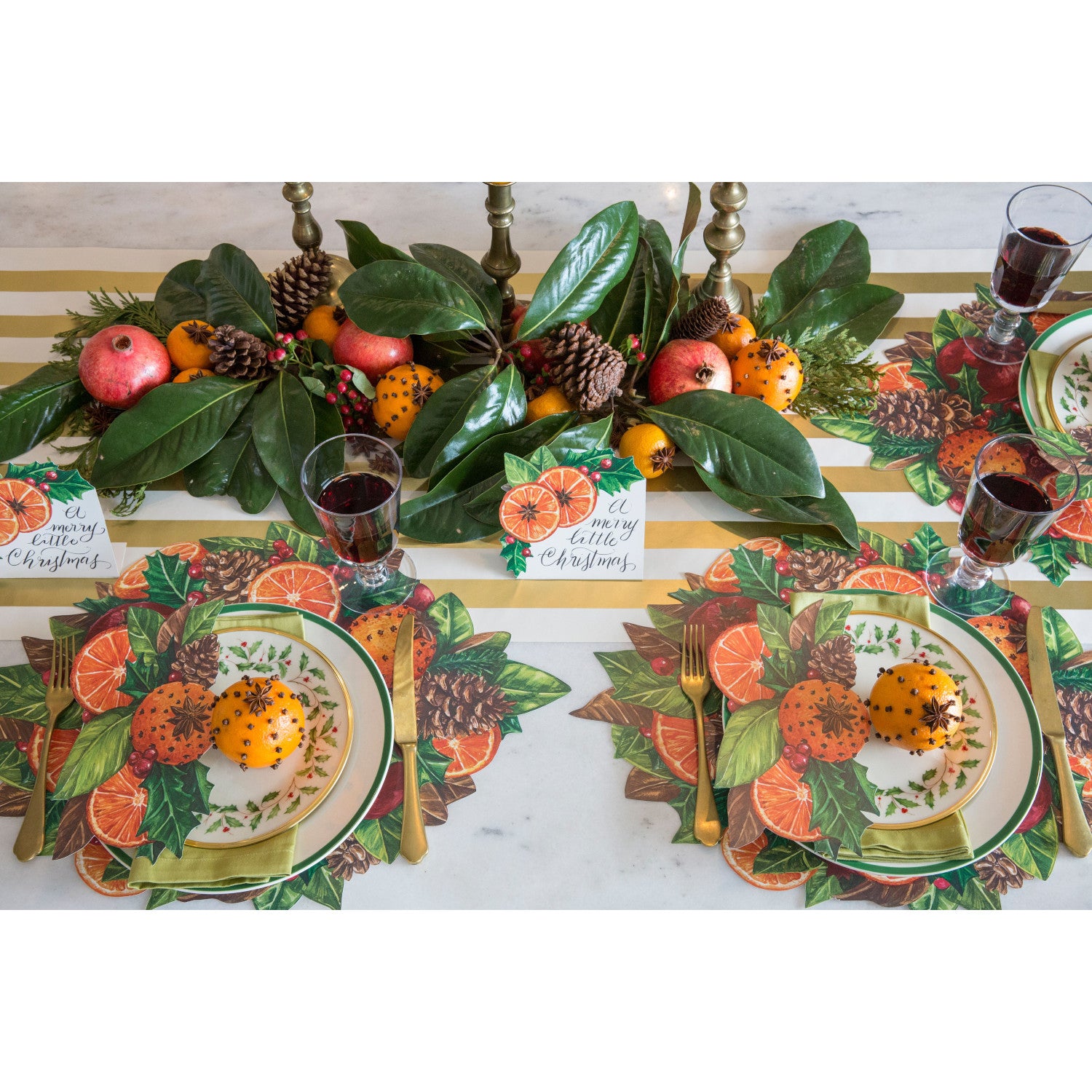The Die-cut Winter Citrus Placemat under a festive table setting.