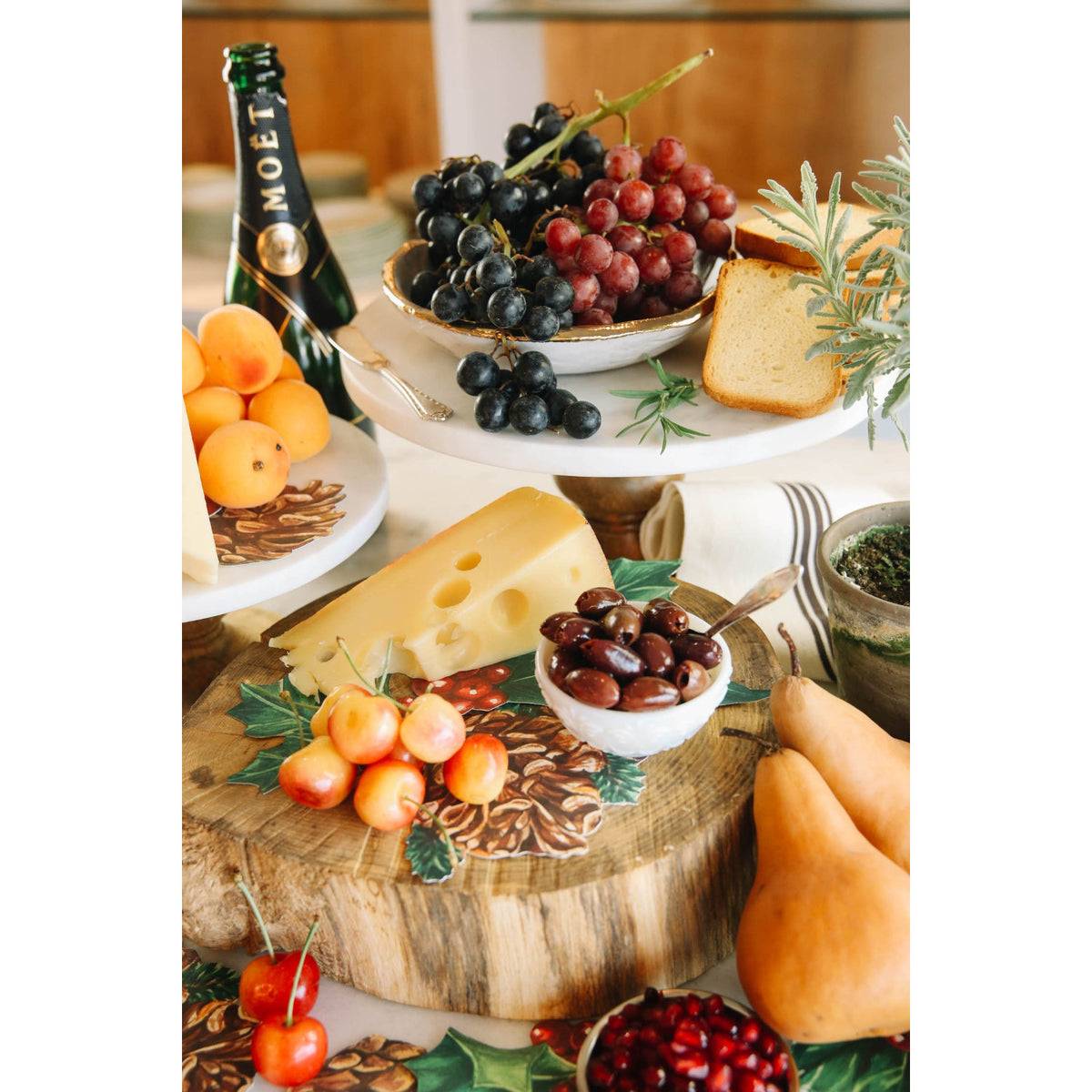 An elegant Holiday grazing table featuring Winter Botanicals Serving Confetti under the food.