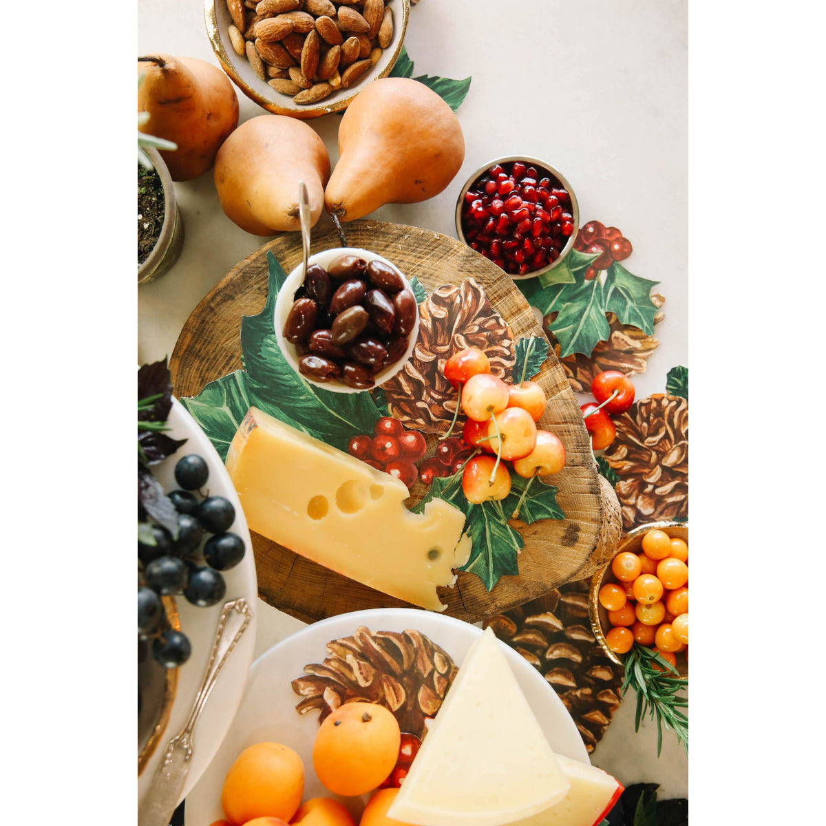 An elegant Holiday grazing table featuring Winter Botanicals Serving Confetti under the food, from above.