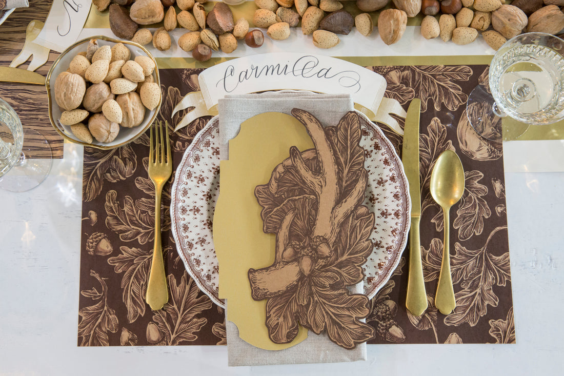 Top-down view of a rustic place setting featuring an Antler Table Accent resting on the plate.