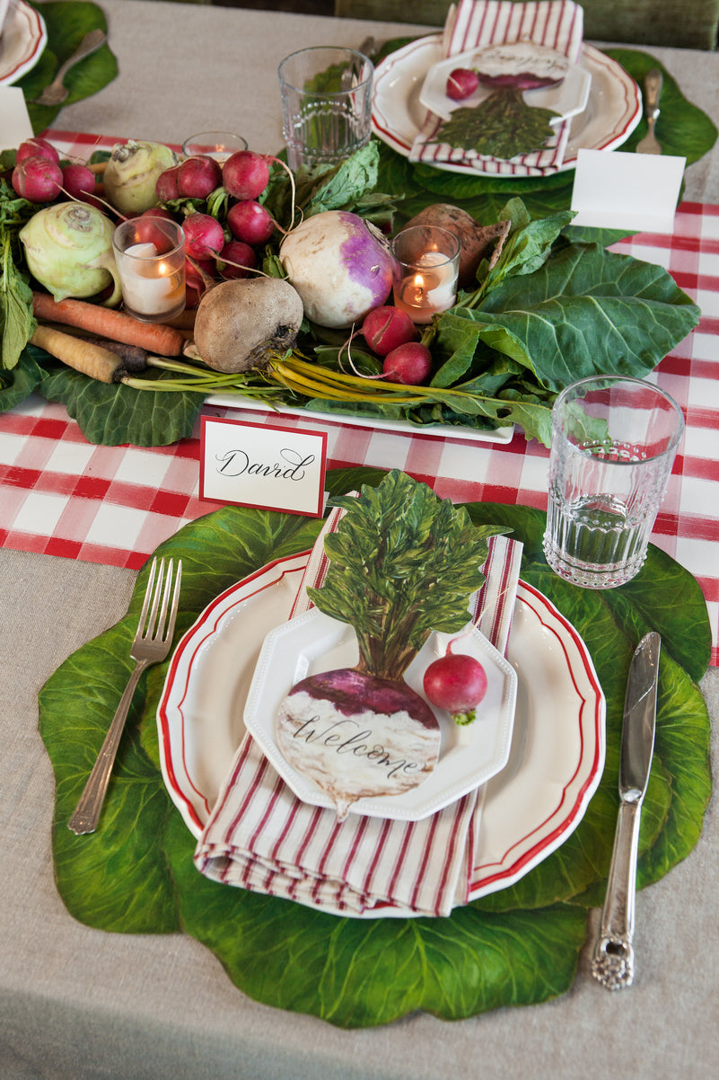 The Die-cut Cabbage Placemat under a vegetable-themed table setting.