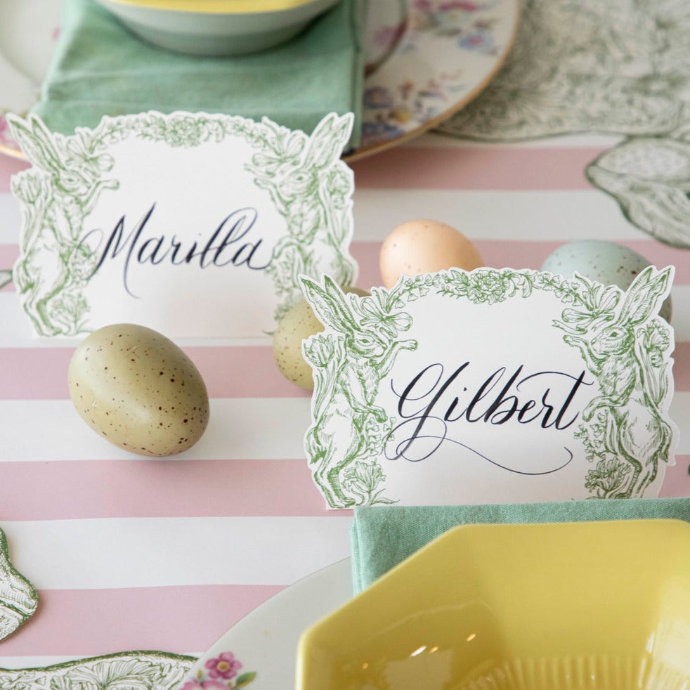 Two Greenhouse Hare Place Cards, labeled &quot;Matilda&quot; and &quot;Gilbert&quot;, as part of an elegant Easter themed table setting.
