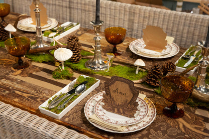 The Into The Woods Placemat under a forest-themed table setting.