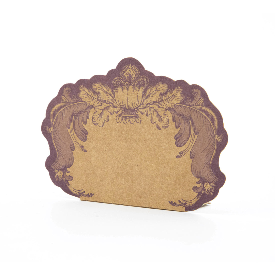 A kraft paper, freestanding place card with an ornate, French toile-style design in deep purple around the edges.