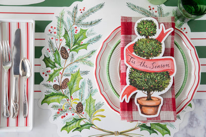 A die-cut illustration of a potted shrub manicured into three balls, with a blank red ribbon twisting around the topiary, creating a space for personalization.