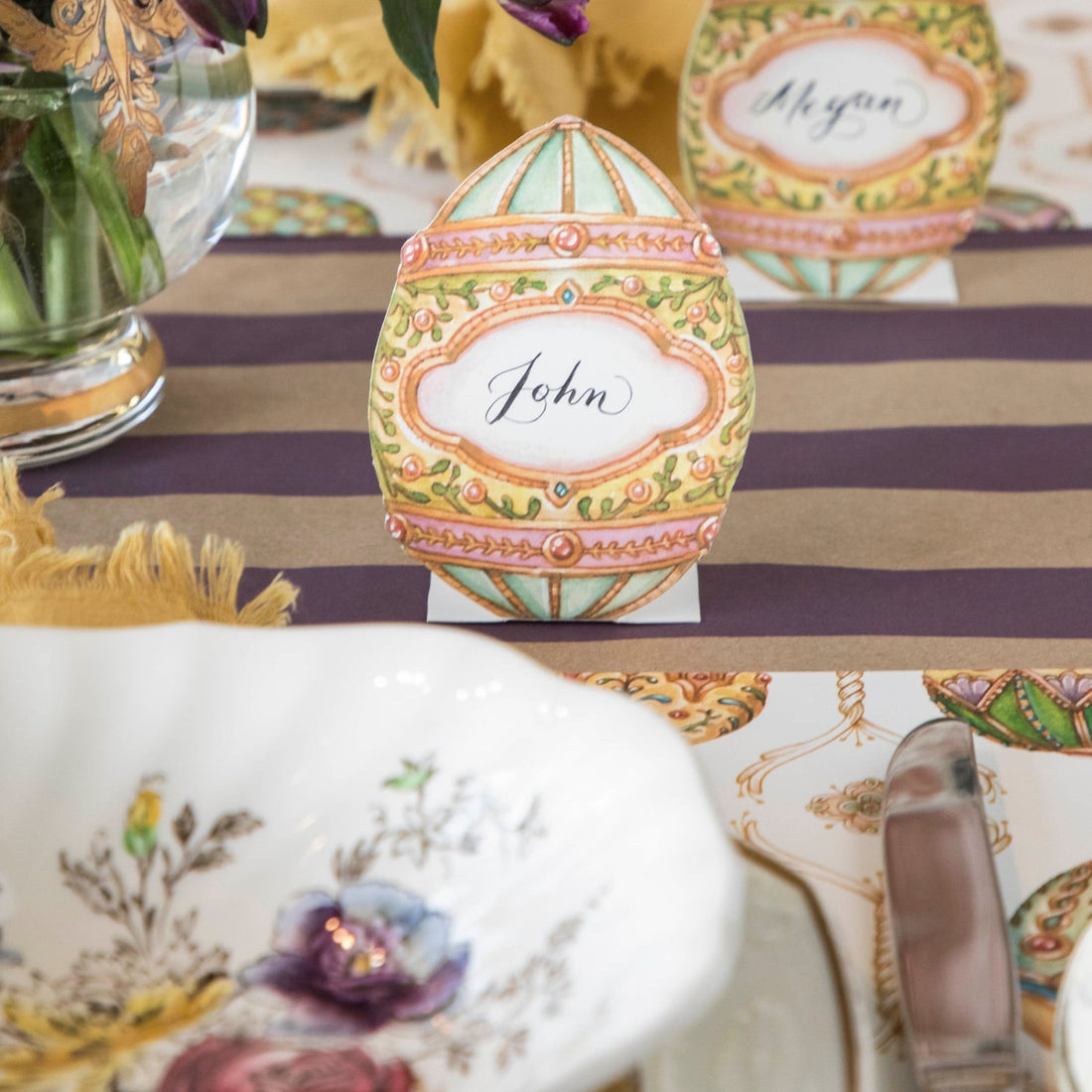 An elegant Easter tablescape featuring an Exquisite Egg Place Card at each place setting.