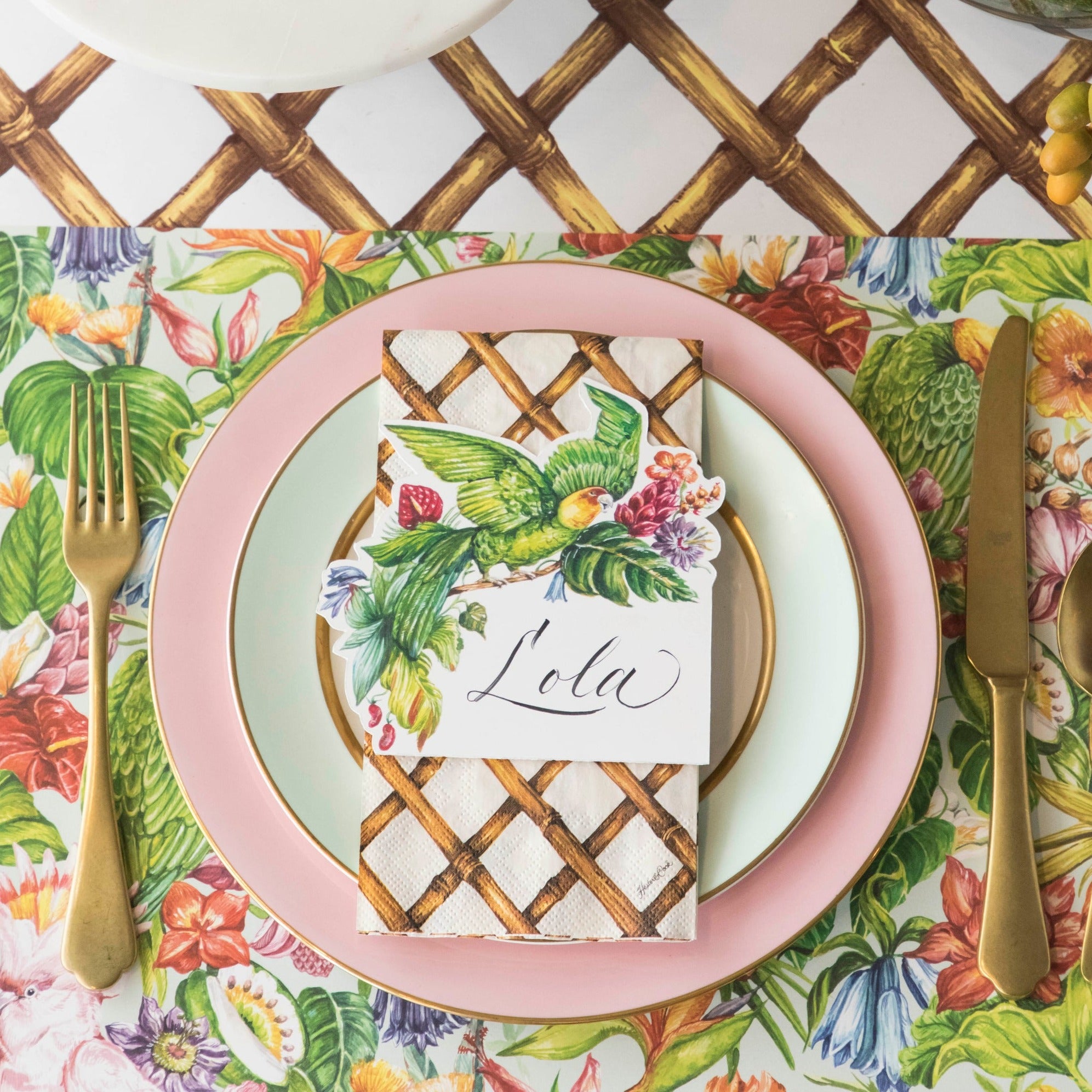 A Birds of Paradise Placemat under a tropical themed place setting. 