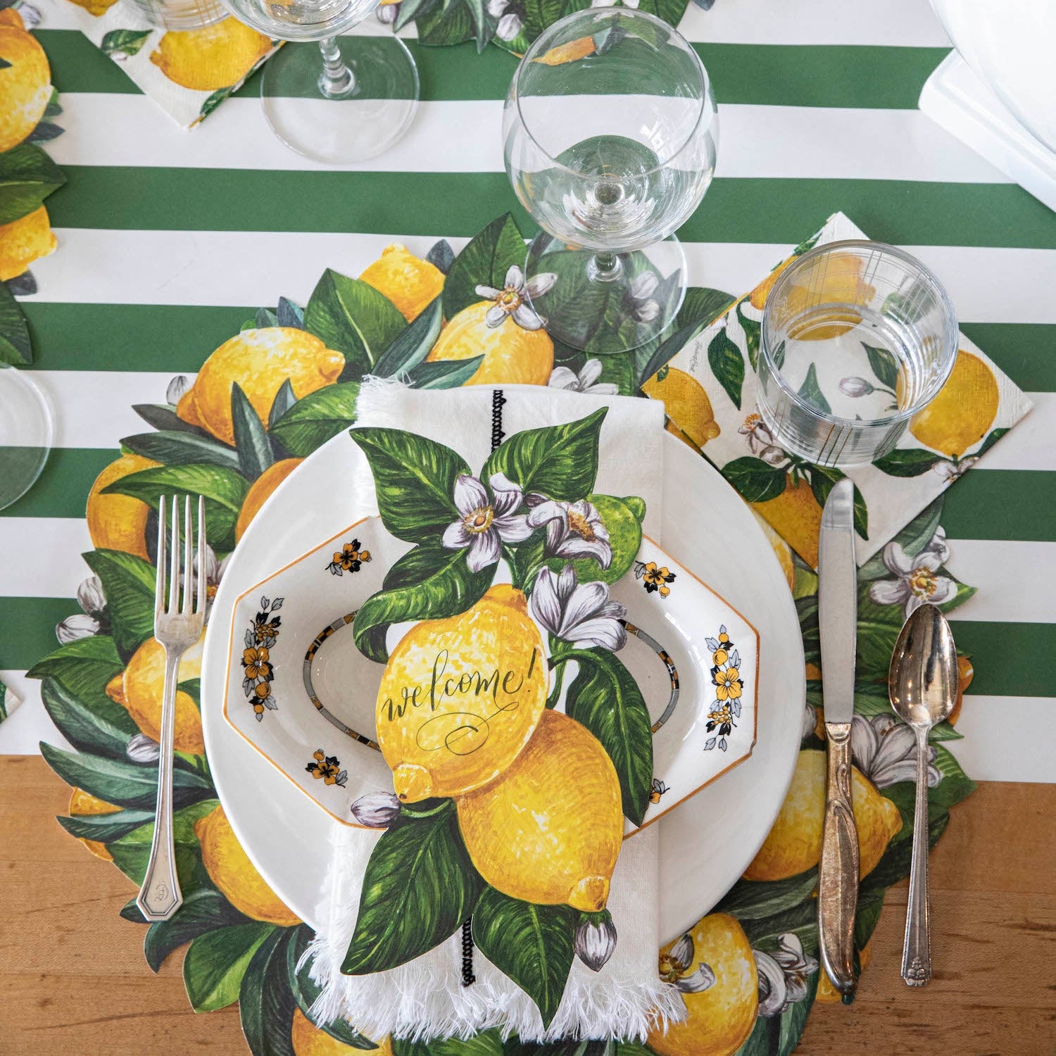 The Die-cut Lemon Wreath under an elegant table setting, from above.
