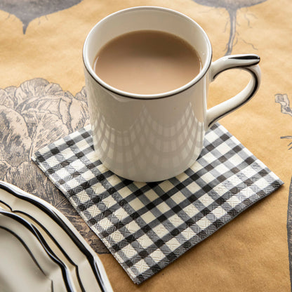 An elegant fall table setting with a Black Painted Cocktail Napkin under a coffee cup.